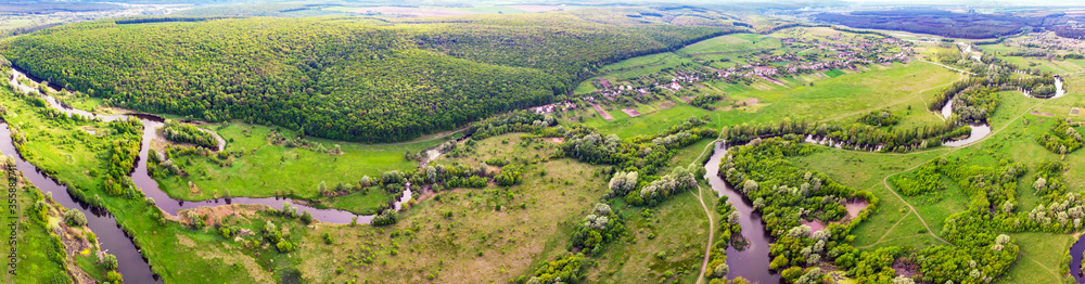 aerial drone landscape of river in green field, top view of beautiful nature texture from drone