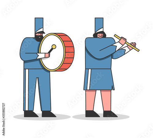 Marching bands musicians playing drums and flute. Military orchestra members