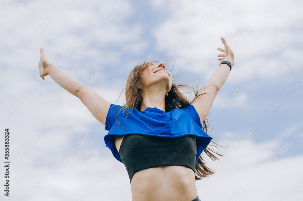 Outdoors portrait of beautiful young girl laughing Outdoors portrait of beautiful young girl laughing