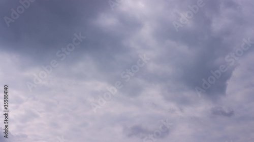 Swirling overcast rainy clouds macro zoom timelapse