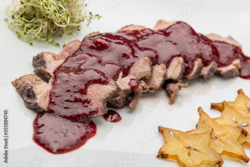 Veal, Beef in cherry sauce. photo