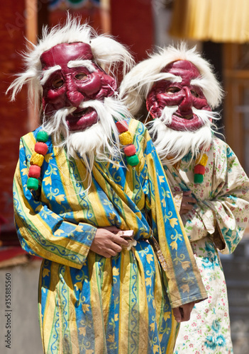 Buddhist monks dancing Cham mystery during Yuru Kabgyat festival at Lamayuru Gompa in Lamayuru, Ladakh, Jammu and Kashmir, Northern India photo