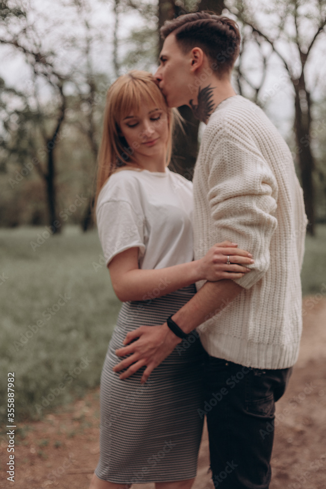 happy young couple in the park