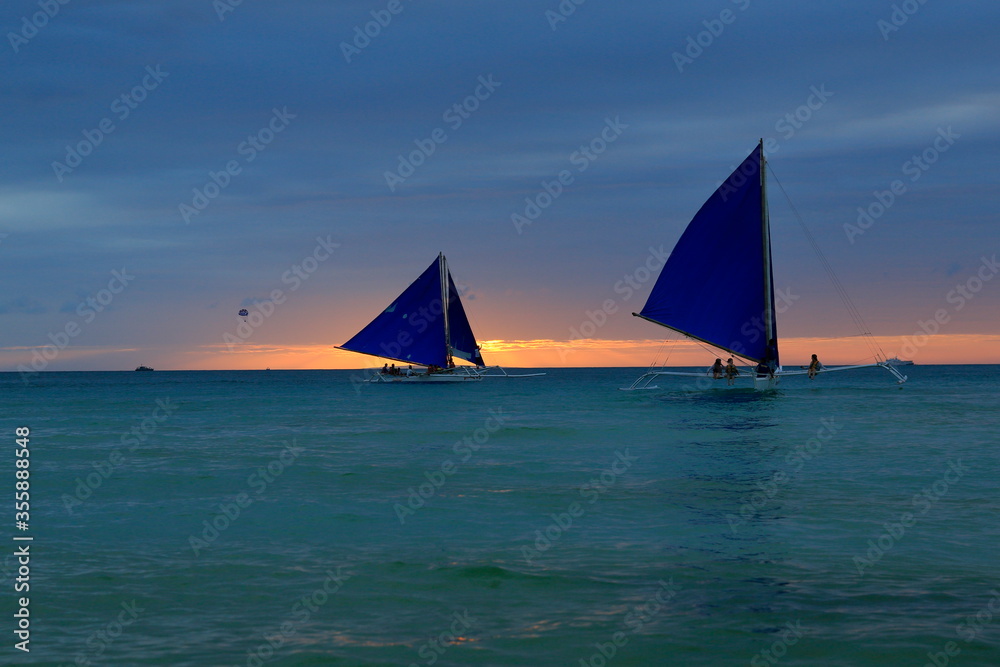 Naklejka premium Wonderful sunset scenes in the exciting Boracay island with spectacular and beautiful nature, Philippines.