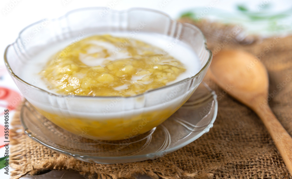 Thai dessert with boiled soy beans and flour In a cup ready to be served
Thai dessert with boiled soy beans and flour In a cup ready to be served