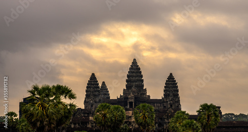 Sunrise sky over the ancient buddhist Khmer temple Angkor Wat, Siem Reap, Cambodia. Angkor Wat silhouette in the morning © D. Kvasnetskyy
