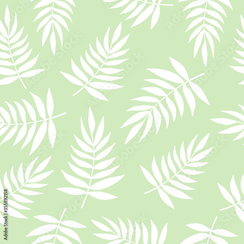 Tropical palm leaves. Vector illustration. Seamless pattern. 