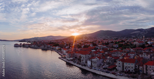 Beautiful sunset landscape. Aerial shot of the Kastel coast in Dalmatia,Croatia.Old town near Adriatic sea.