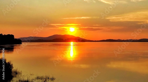 ONE OF THE BEST TOURIST PLACES TO VISIT IN ASSAM,INDIA,A SUNSET VIEW FROM THE BANK OF BRAHMAPUTRA RIVER