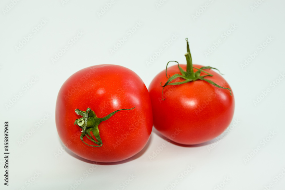 Fresh summer vegetables for salad. Sweet red tomatoes and pepper. Food for vegetarians Fresh summer vegetables for salad. Sweet red tomatoes and pepper. Food for vegetarians