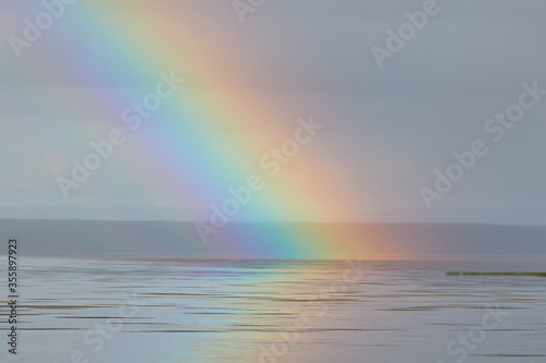 Rainbow ending in the water