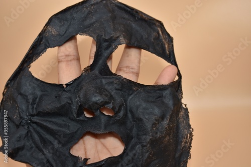 Black mud sheet for removing blackheads that has been peeled off photo