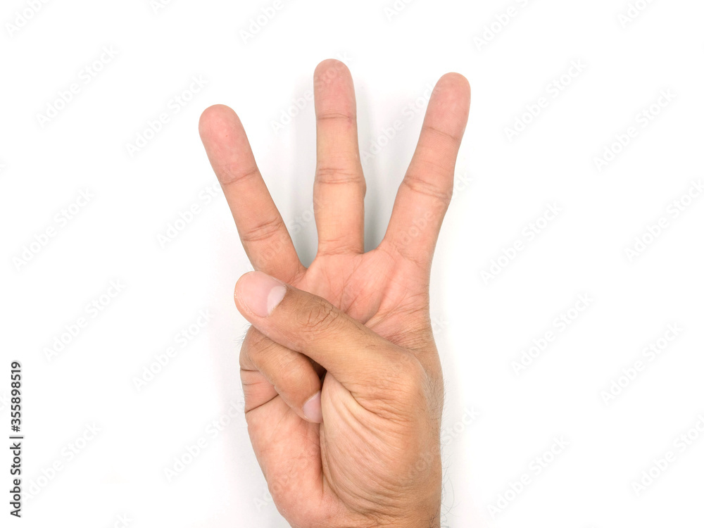 A hand showing three fingers isolated on white background with clipping path included. A hand showing three fingers isolated on white background with clipping path included.