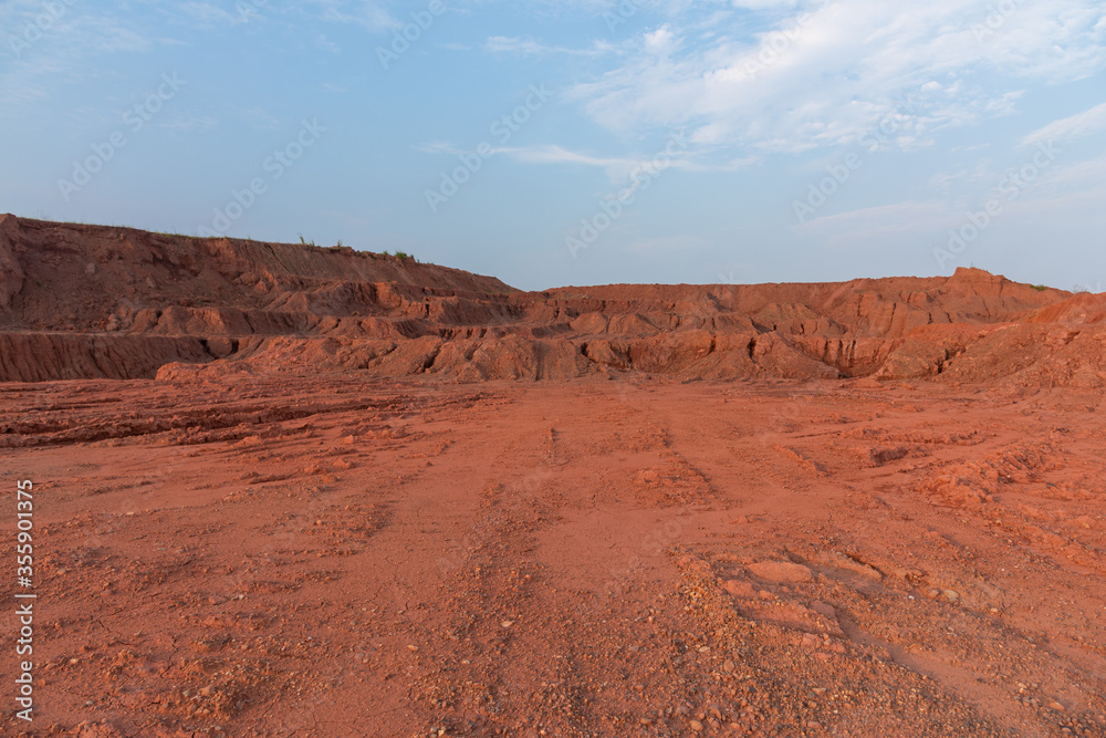 The mound and dirt surface on the construction site