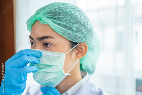 Medical staff wearing face shield and medical mask