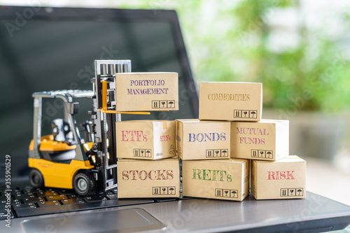 Photos Online portfolio management for long-term sustainable growth, asset allocation and investment concept : Boxes of financial products e