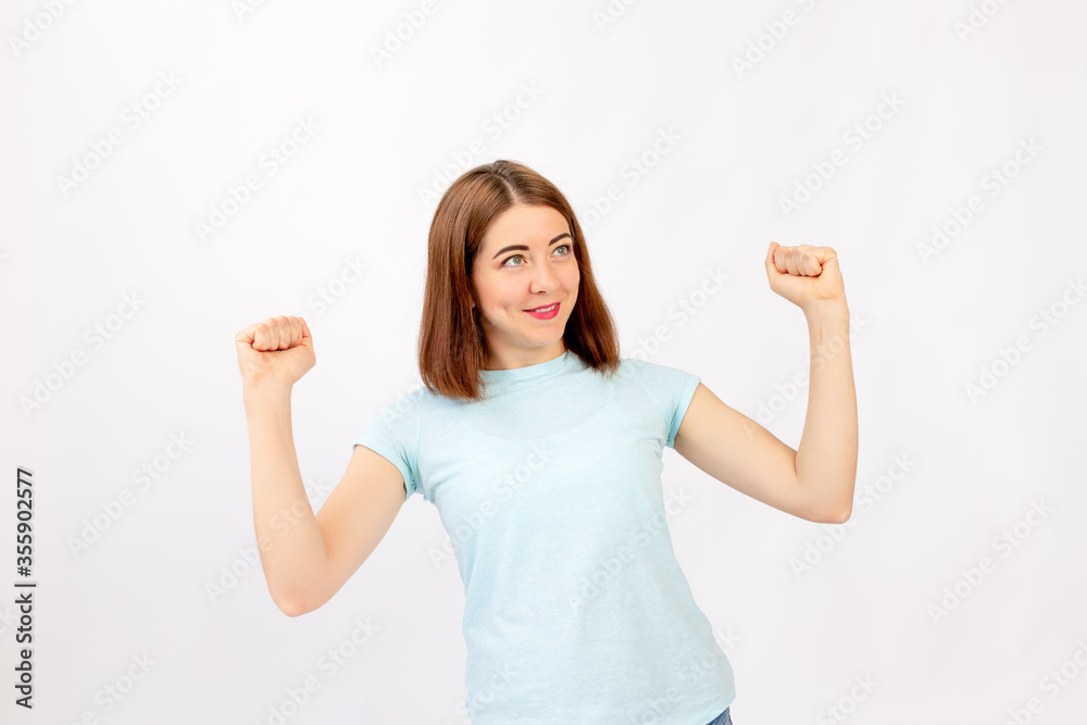Successful young female teenager in casual showing yes, isolated on white background Successful young female teenager in casual showing yes, isolated on white background