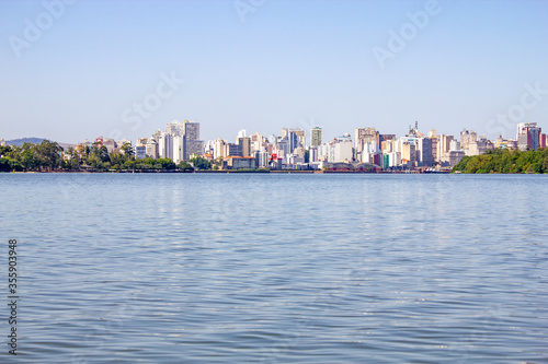 Buildings in Porto Alegre city and Guaiba river © lisandrotrarbach
