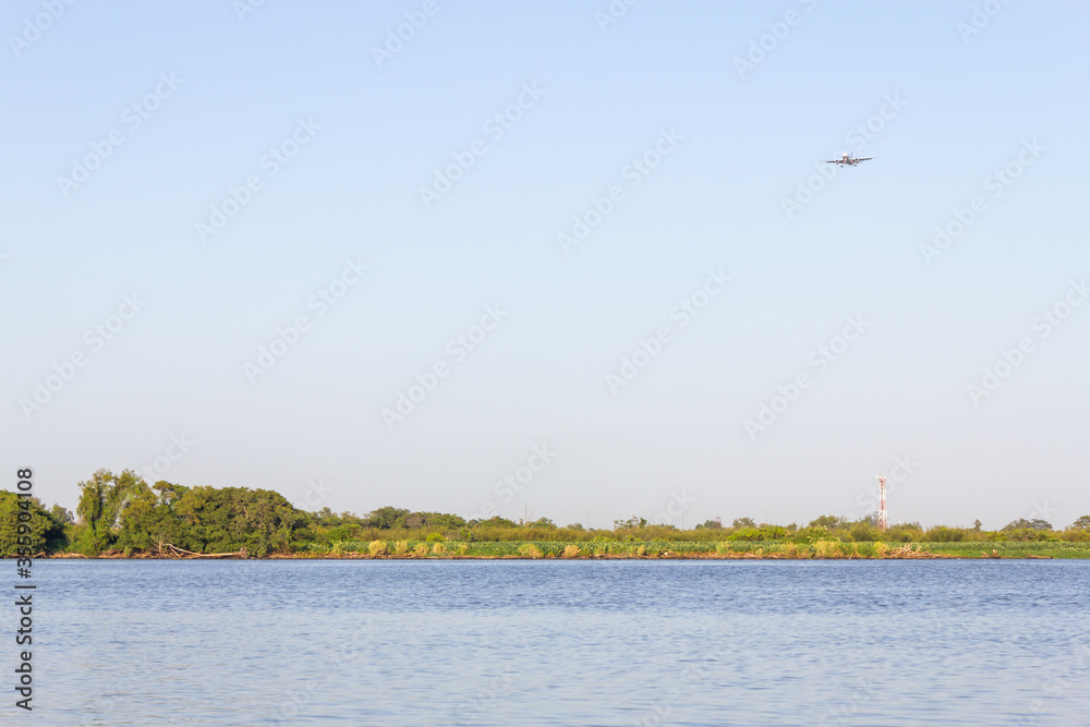 Airplane over Guaiba lake in Porto Alegre