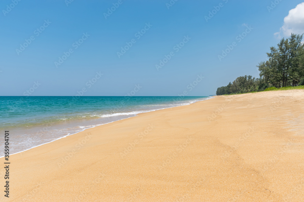 Beautiful tropical landscape beach sea and sand with blue sky in Mai Khao Beach,Phuket, Thailand .