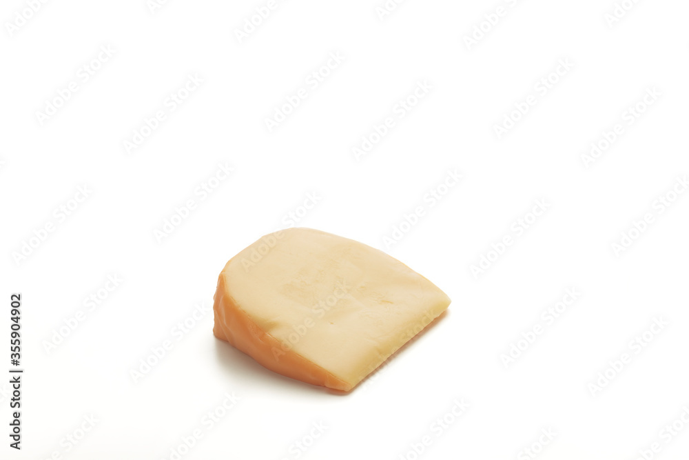 Hard Dutch gouda cheese on white