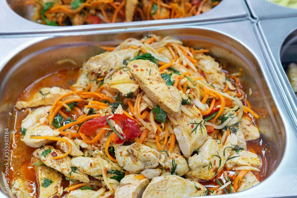 Korean salad with chicken and vegetables. close-up, Korean cuisine Korean salad with chicken and vegetables. close-up, Korean cuisine