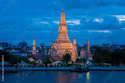 Wat Arun landmark of Bangkok at dusk with beautiful scene.