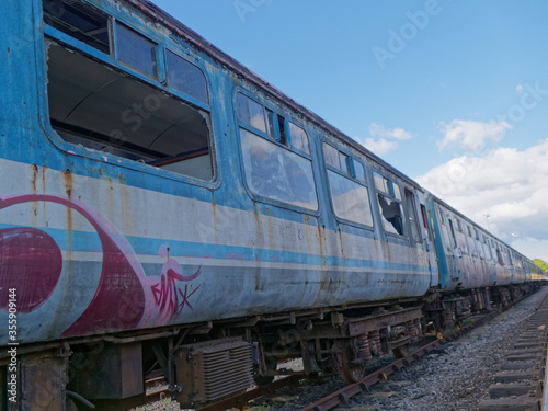 Graffiti and vandalism on old abandoned train carriages, on the East Lancashire Railway.