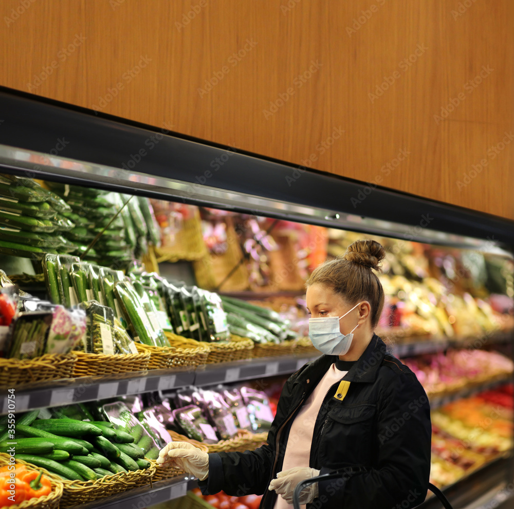 Supermarket shopping, face mask and gloves,Woman buying vegetables at the market	
