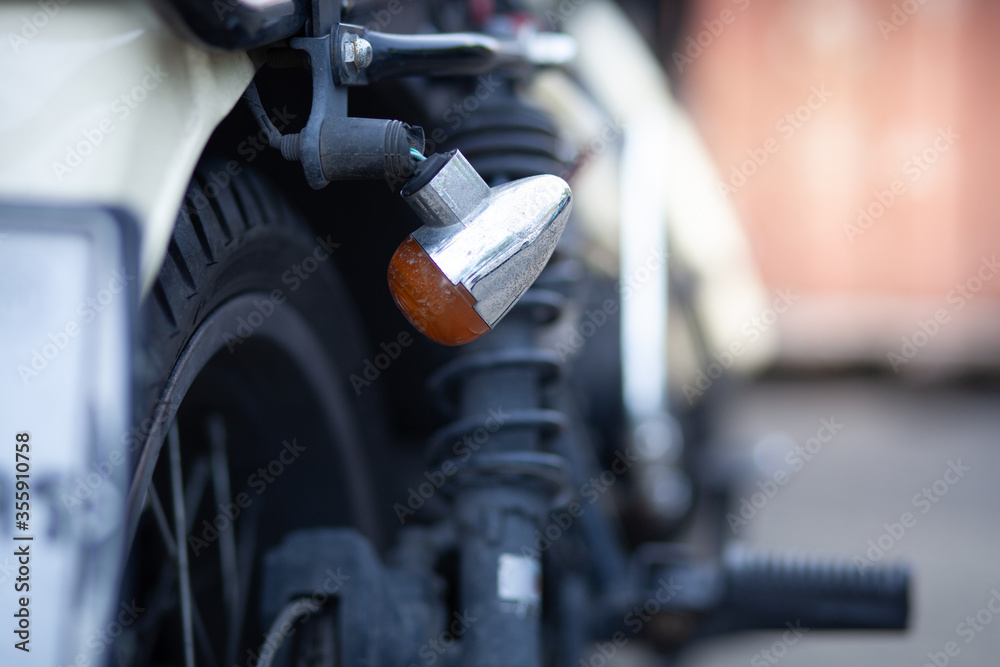 Naklejka premium The motorcycle rear light is damaged.