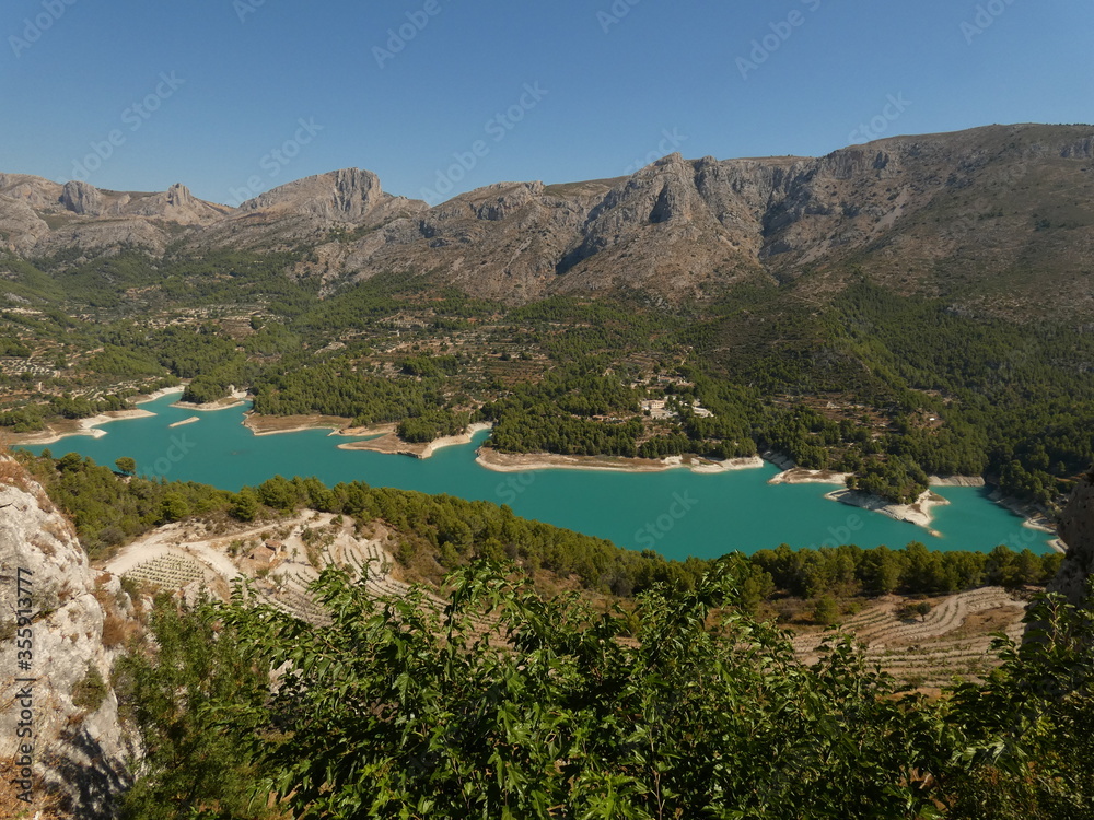 Guadalest Reservoir (El embalse de Guadalest) - emerald green waters surrounded by mountains, Alicante province, Spain