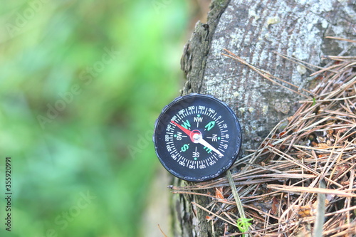 round compass on natural background