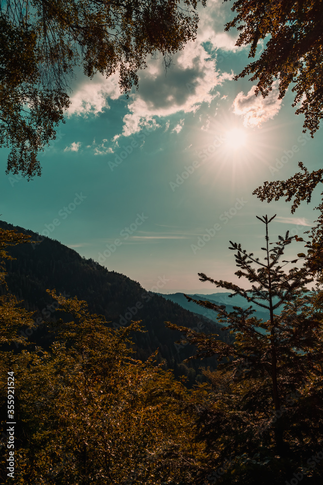 Obraz premium Sun over the mountains of Germany's Black Forest (Schwarzwald)