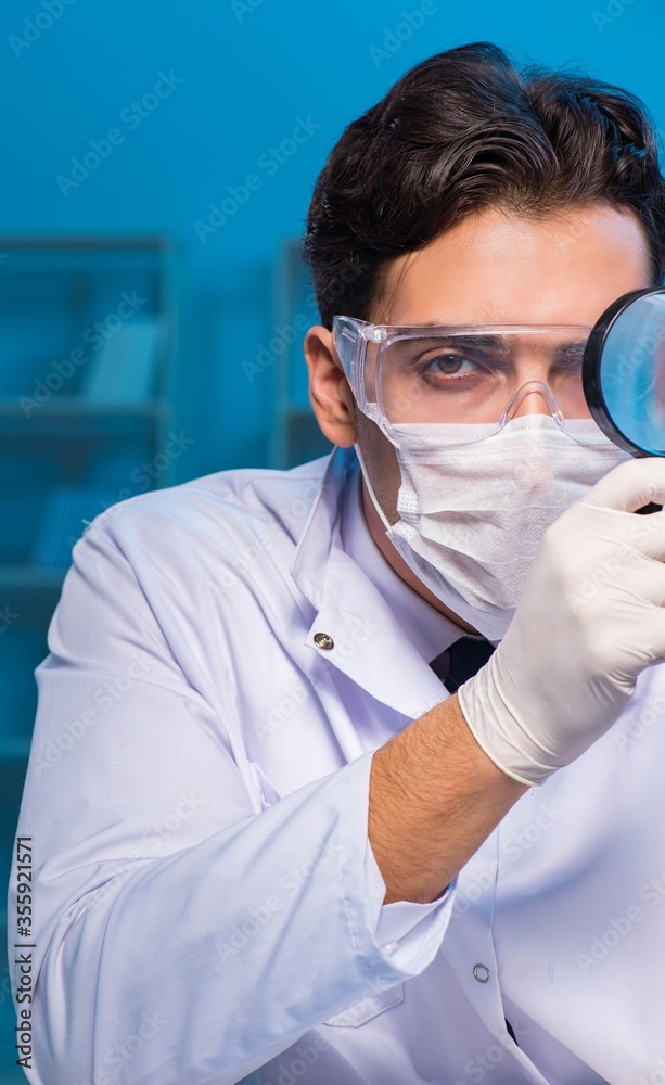Chemistry assistant working in the chemical lab Chemistry assistant working in the chemical lab