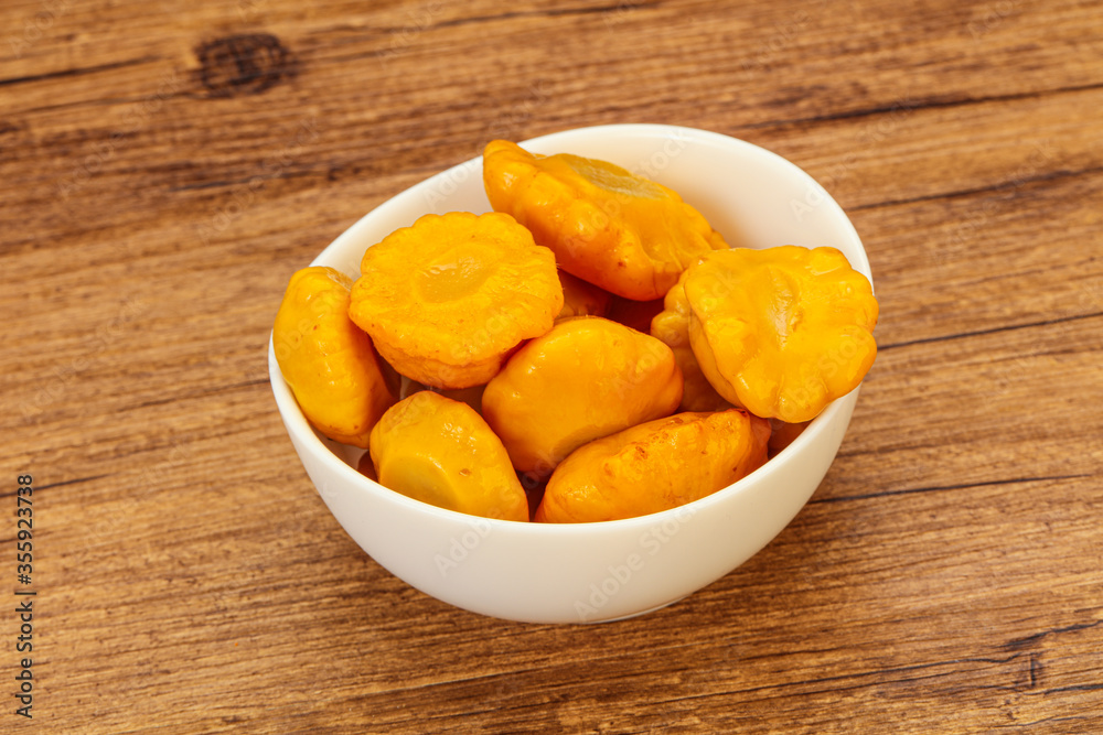 Marinated yellow patisson in the bowl Marinated yellow patisson in the bowl