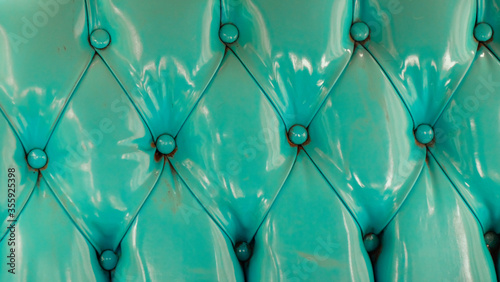 Green plastic couch background