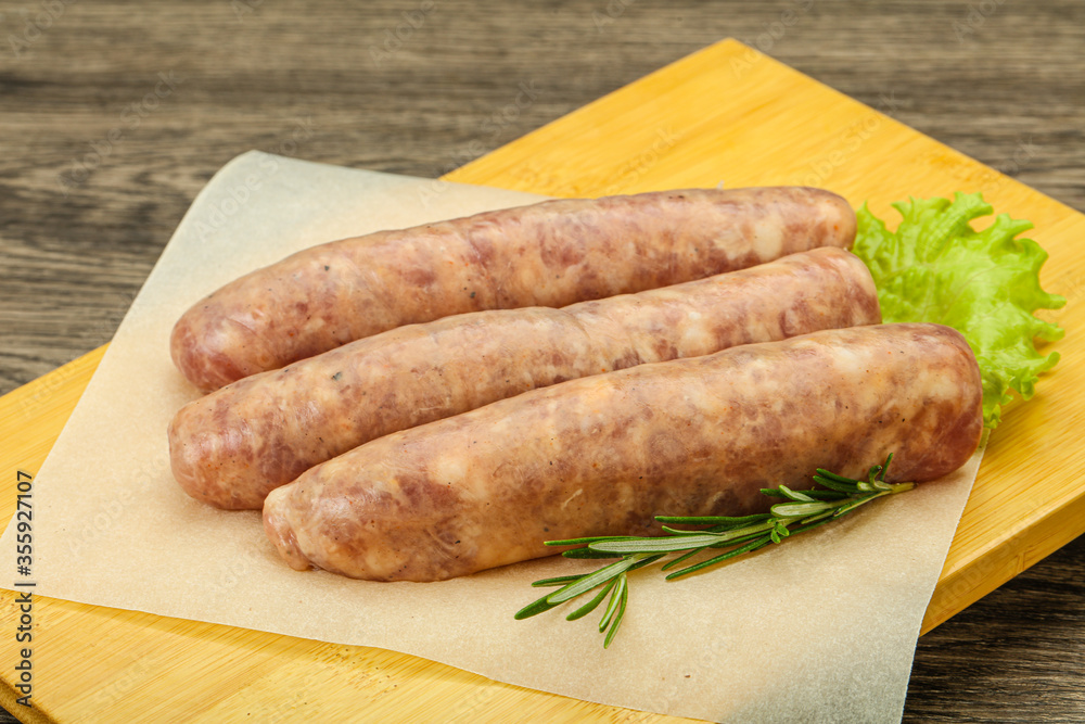 Raw pork meat sausages for grill Raw pork meat sausages for grill