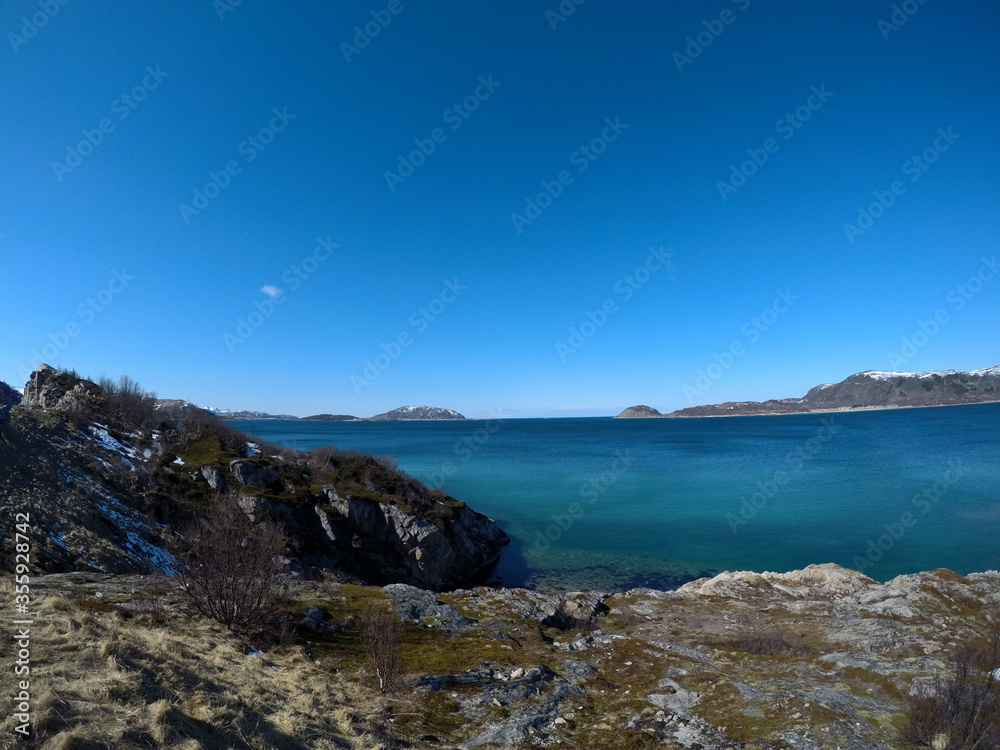 beautiful sea and mountain landscape in northern norway in early spring beautiful sea and mountain landscape in northern norway in early spring