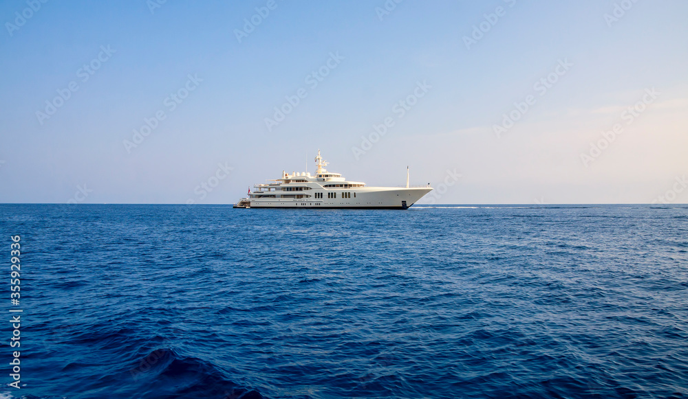 Luxury private motor yacht at sea.