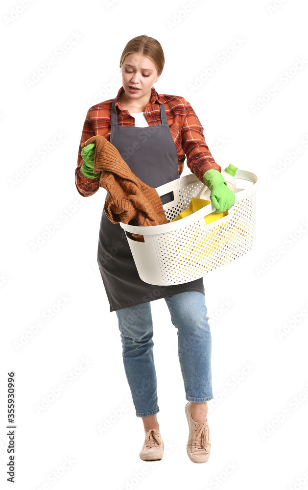 Troubled woman with laundry on white background Troubled woman with laundry on white background