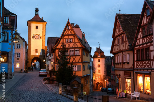 Evening view of Schmiedgasse and Kobolzeller Steige streets with Plonlein Little Square and Siebers Tower in Rothenburg ob der Tauber, Bavaria, Germany. November 2014