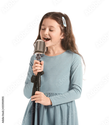 Cute little girl singing ag...