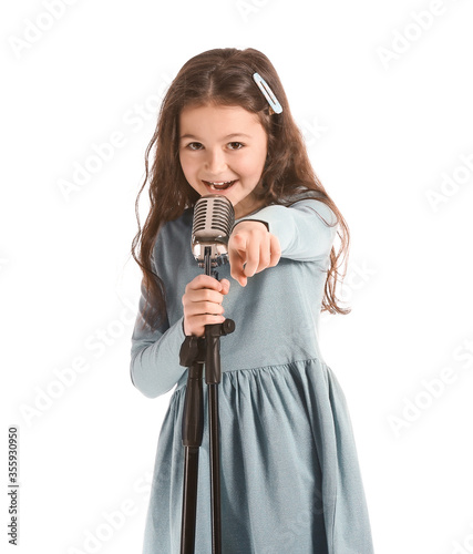 Cute little girl singing ag...