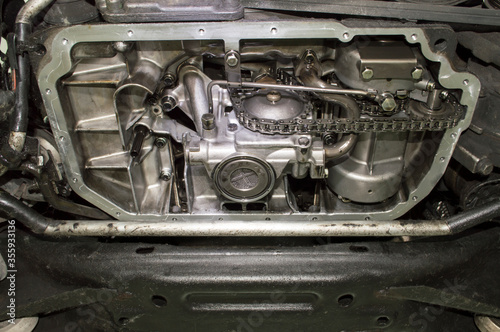Quadro su tela Bottom view of the internal combustion engine without oil sump