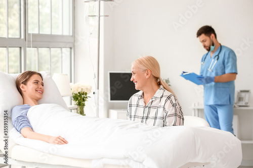 Mother visiting her daughter in hospital