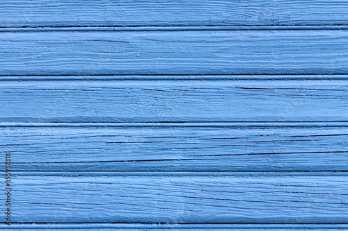 Vintage wood background with peeling blue paint