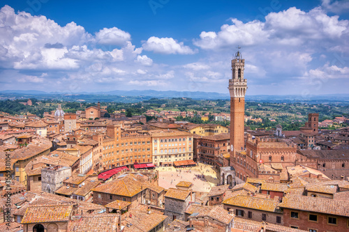  Piazza del Campo with The Torre del Mangia tower in Siena.