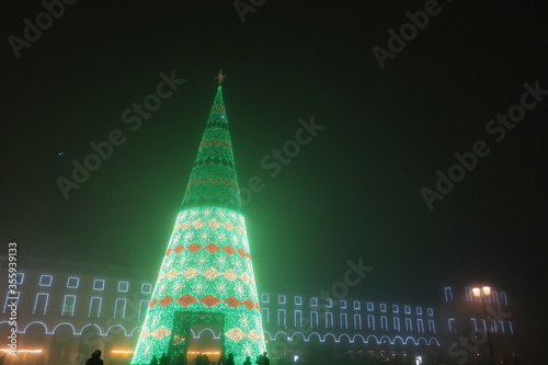 Glowing green Christmas Tree in Lisbon