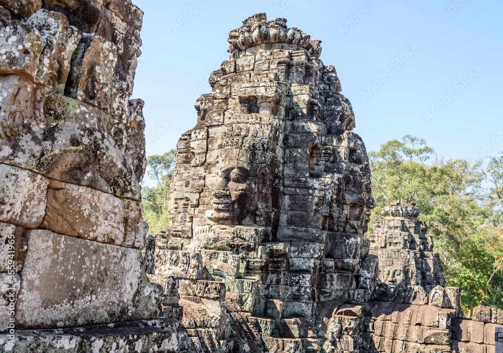 Buddha Faced Tower at the Bayon Temple at the Angkor Wat Complex in Siem Reap Cambodia