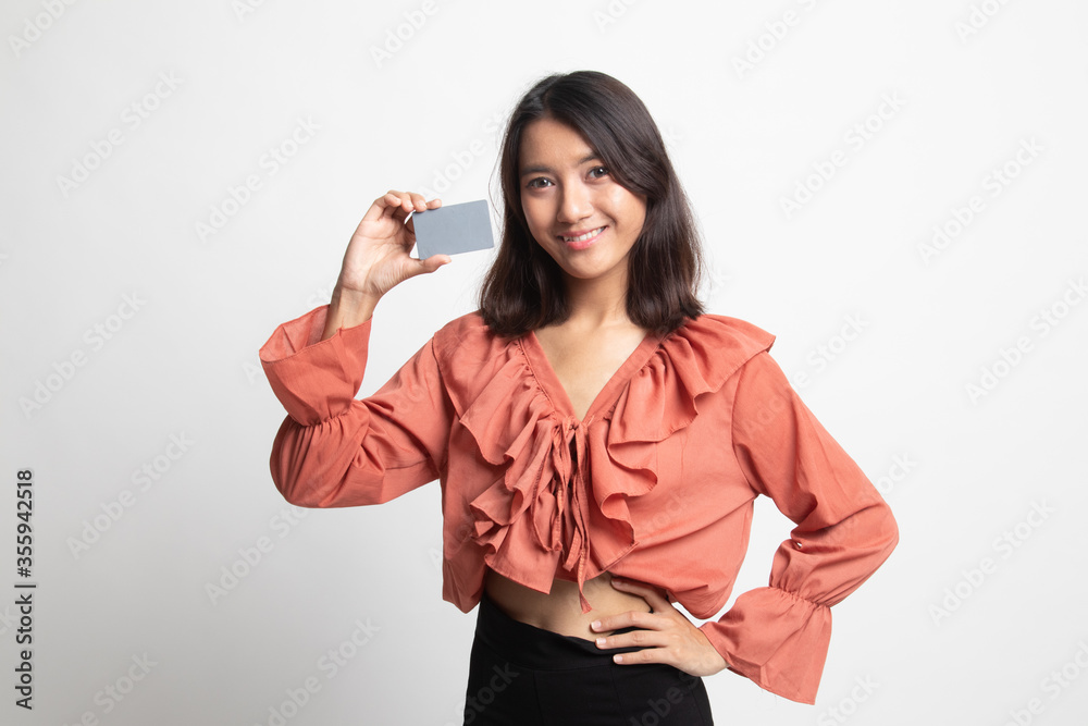Young Asian woman smile with blank card . Young Asian woman smile with blank card .